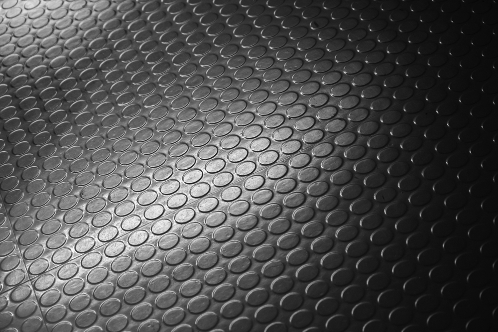 Shiny,Black,Dotted,Rubber,Carpet,Relief.,Background,Photo,With,Selective